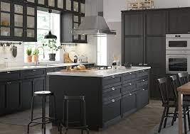 Dark wood cabinets are a timeless option to own in every type of kitchen, either modern or with a classic design. Kitchen Compare Helps You To Get The Best Deal For Your Kitchen