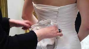 This holds the dress in place as you work. How To Lace And Tie A Wedding Dress By Lori G Bridal Derby Youtube