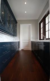 Planning And Building Kitchens Hardwood Floors Gray Walls Gray Wall Color Ga Navy Blue Kitchen Cabinets Hardwood Floors In Kitchen Blue Kitchen Cabinets