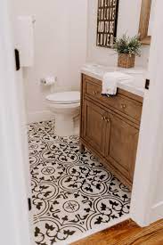 Choosing a farmhouse bathroom floor tile can be a daunting task. Black And White Tile With A Walnut Vanity Are Perfection In This Modern Farmhouse Style Renovation Bathroom Style Black And White Tiles Bathroom Makeover