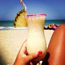 Specifically, this wine is called beach colada, but the coconut and pineapple images on the label are enough to prove that it's based on the beloved piña colada drink. Pina Coladas On The Beach In The Dominican Republic Pina Colada Colada Beach Drinks