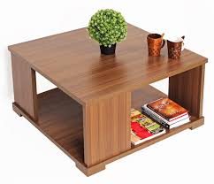 From coffee tables to computer desks, and bedside tables to dining sets. Bluewud Noel Engineered Wood Coffee Table Centre Table With Shelves Square Walnut Buy Online In Andorra At Andorra Desertcart Com Productid 76009495