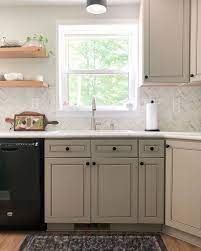 Greige bridges the gap between. Greige Gray Kitchen Cabinets Black Hardware Open Shelving Herringbone Tile Laminate Countertops Greige Cabinets Beige Cabinets Taupe Cabinets