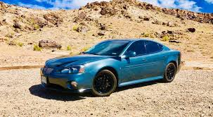 Image result for Dark Tropic Teal 2004 Pontiac