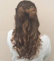 The side part adds definition (so it's not too casual), and the piecey bangs at the sides give it softness. 50 Half Up Half Down Hairstyles For Everyday And Party Looks