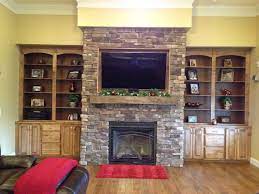 A few weeks ago i reached out to airstone to see if they would be willing to partner with me on our fireplace design. Entertainment Center With Built In Book Shelves Rough Lumber Mantel And Rock Gas L Fireplace Entertainment Fireplace Entertainment Center Entertainment Center