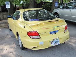 Image result for Pastel Yellow 2000 Tiburon