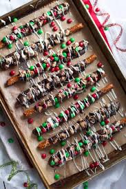 Start a new holiday tradition this year by making some of these delicious treats. Candy Covered Chocolate Dipped Pretzels