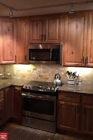 Knotty Alder Cabinets Natural Stain Knotty Alder Cabinets Light Brown Granite Counter Tops Dark B Staining Cabinets Kitchen Cabinets Alder Kitchen Cabinets