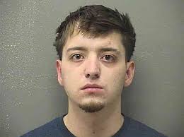 Man charged with DWI after wrecking behind a police unit