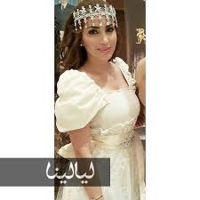صور نسرين طافش بـ4 إطلالات جزائرية تقليدية وهذا سر فخرها بالبلوزة الوهرانية أيها أعجبتكم موقع ليالينا Wedding Dresses Lace Dresses Wedding Dresses