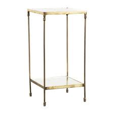 This side table is made from solid metal in a brushed brass finish. Square Luxe Gold Glass Side Table
