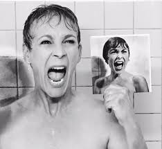 Jamie Lee Curtis recreating the iconic shower scene from the movie “Psycho”  (1960) that starred her mother, Janet Leigh*