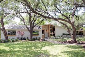 White and black painted brick house. 20 Homes With Breathtaking Painted Brick Hgtv