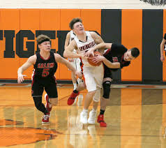 Tigers spring past Quakers in opener