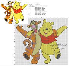 A cute little bear wearing a santa hat. Free Winnie The Pooh Cross Stitch Patterns