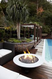 If your family loves the pool, you're definitely going to love this outdoor fireplace idea. Backyard Garden Fire Pit Ideas Novocom Top