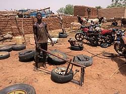 Then, the air is forced through an opening in the tank, where pressure builds up. Air Compressor Wikipedia