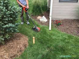 If you are just raising a lawn you can order in topsoil to fill the gap behind your retaining wall. How S That For A Long Title Prior To Our Departure For Italy We Got Quite A Bit Of Yard Work Done S How To Remove Grass Grasses For Landscaping Garden Edger
