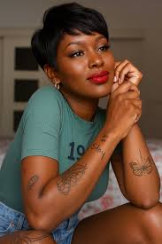 Dark-skinned woman with same hairstyle