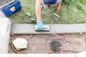 Mix 3 1/2 parts sand with 1 part cement with water. Install Concrete Landscape Edging Aka Concrete Border Twofeetfirst