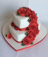 Michaela 2 Tier Heart Shaped Wedding Cake With Cascade Of Red Sugar Roses Wedding Cake Red Wedding Cake Two Tier Purple Wedding Cakes