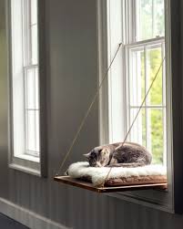 11 cat crafts that are perfect for your feline friend diy cat bed cat window cat window perch