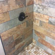 We Installed Slate Tiles With Mosaic Shower Base And Weathered Wood Look Ceramic Tile Floor Bigbe Wood Tile Shower Ceramic Tile Bathrooms Shower Tile Designs