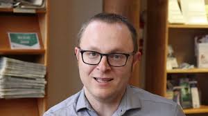 Library Director Isaac Huffman gives a brief update