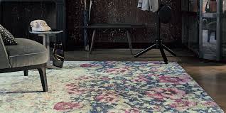 And stylish furniture, real photo with copy space. How To Choose The Best Living Room Rug For Your Home