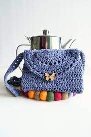 If you have never knitted with double pointed needles, don't panic! Ravelry Eyelet Purse Pattern By Knitting With Chopsticks