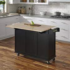 A solid butcher block top and drop leaf along with the enclosed storage cabinet is a must have for anyone needing a bit more storage and workspace. Drop Leaf Kitchen Island Table Ideas On Foter