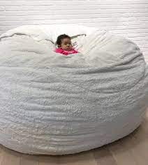 Hope This Baby Can See The Movie Screen Beyond The Huge Sac She S Sunken Down Into Sacs Lovesac Bean Bag Chair Bean Bag Living Room Cozy Room Decor