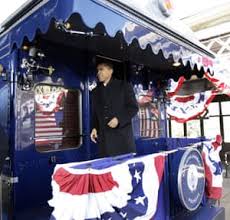 Barack Obama boards train to Washington