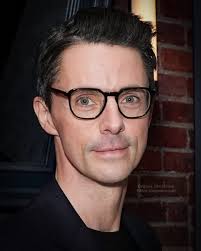I just love this recent pic of Matthew. Bespectacled, silver fox, trademark  goode smirk, beautiful direct green gaze 💚, perfection! 📷 Matthew Goode  at the special screening of Freud's Last Session hosted