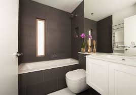 This condo interior design is like a slice of india in singapore, with warm wooden furniture and contrasting white elements. 20 Gorgeous Tiled Modern Bathrooms In Condominiums Home Design Lover
