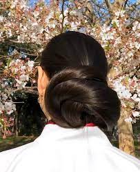 Video Under The Cherry Blossom Bun Hairstyles For Long Hair Long Hair Girl Long Hair Styles