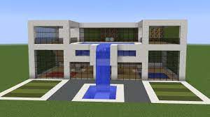 a new tutorial on how to build a cool modern house in minecraft this building features a rooftop sw minecraft modern modern minecraft houses minecraft mansion