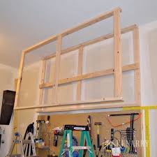You might actually park your car in the garage now! Diy Garage Storage Ceiling Mounted Shelves Giveaway