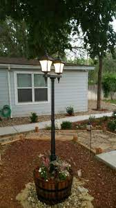 Diy Solar Lamp Post In Whiskey Barrel Outdoor Post Lights Solar Garden Lanterns Diy Outdoor Lighting