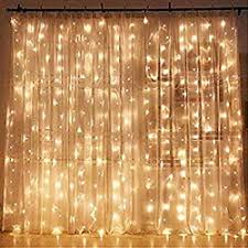 Christmas lights are number one in creating a festive mood, and even if there are no other decorations, these lights will make you think of christmas. Amazon Com Twinkle Star 300 Led Window Curtain String Light Wedding Party Home Garden Bedroom Outdoor Indoor Wall Decorations Warm White Home Kitchen