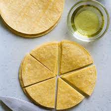 Sprinkle a drop of water into the pan and when it pops, the oil is hot enough to start cooking the tortillas. How To Fry Tortillas Culinary Hill
