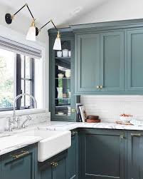 Going into 2021, wood stained kitchen cabinets will still be popular in more traditional kitchens. Task Lighting Above The Sink A Mix Of Finishes Marble Countertops Bold Cabinets We Re Placing T Kitchen Color Trends Kitchen Design Interior Design Kitchen