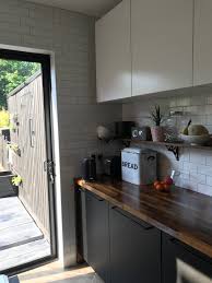 I'm not alone in wanting cane cabinet doors. Galley Kitchen Sliding Patio Doors Metro Tiles Ikea Kungsbacka Walnut Worktops Black Interior Design Kitchen Small White Ikea Kitchen Kitchen Inspirations