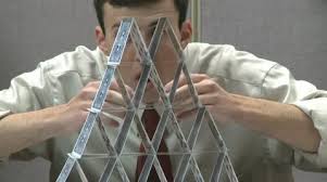The house of swords is about intelligence, communication, language, tough decisions, consequences, and the divine. Man Building House Of Cards Stock Video Pond5