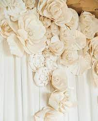 15 Chic Ways To Use Paper Flowers At Your Wedding Paper Flowers Wedding Giant Paper Flowers Paper Flower Decor