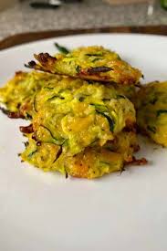 The trick to getting these crisp around the edges is to squeeze out the most juice possible. Baked Zucchini Cheesy Fritter