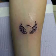 Small angel wings tattoo with name. Pin By Lindsy Cali On Tatoo Trendy Tattoos Tiny Tattoos Tattoos For Daughters