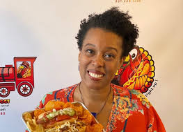 Annah Mitchell is providing smiles and scholarships with Gobble Doggs