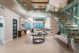 Modern Foyer With Glass Staircase And Railings And Contemporary Furnishings Hgtv